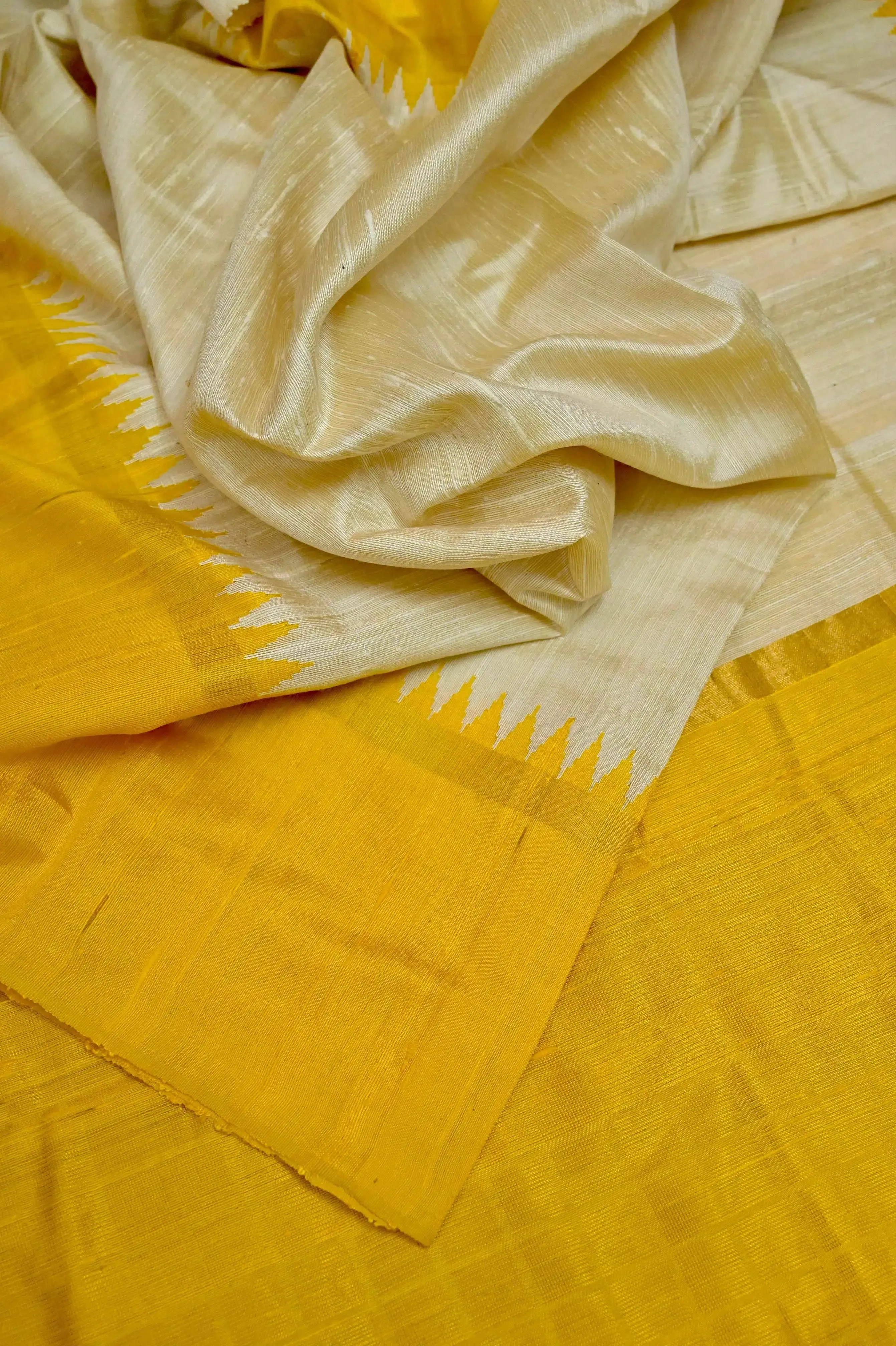 Offwhite and Yellow Color Pure Raw Silk Saree